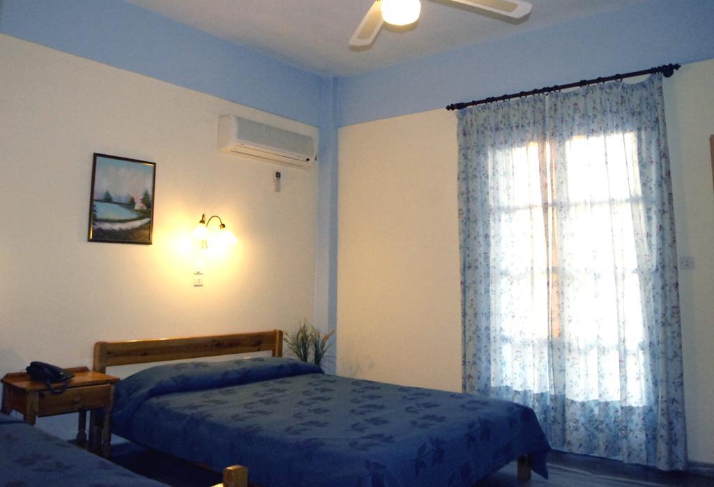Idroussa Apartment Баци Стая снимка