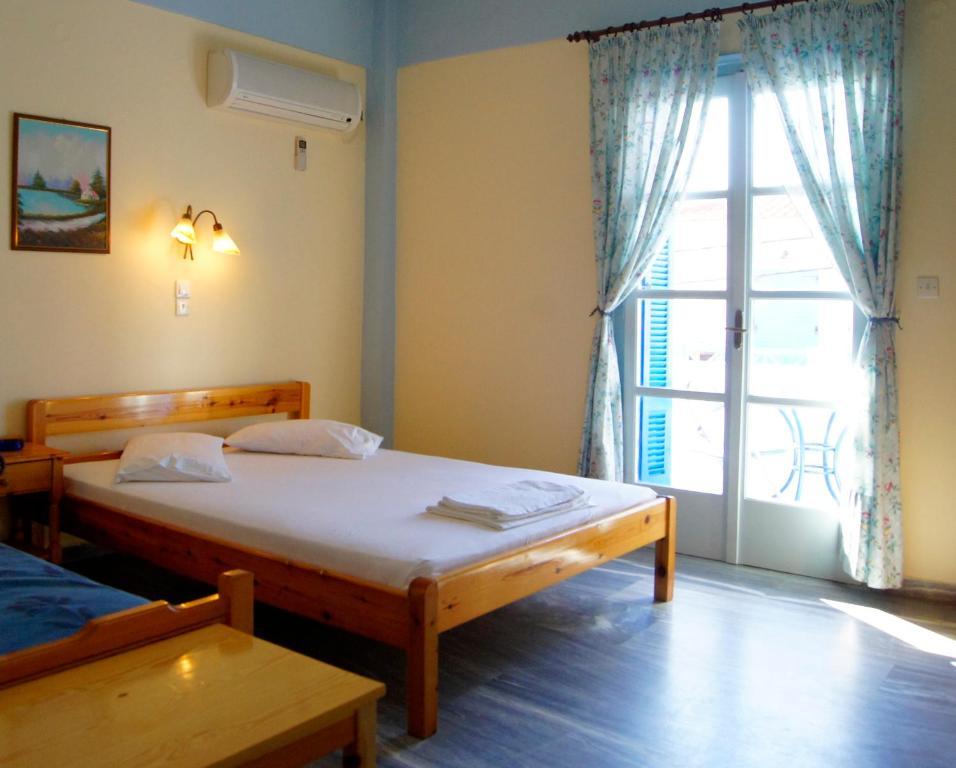 Idroussa Apartment Баци Стая снимка